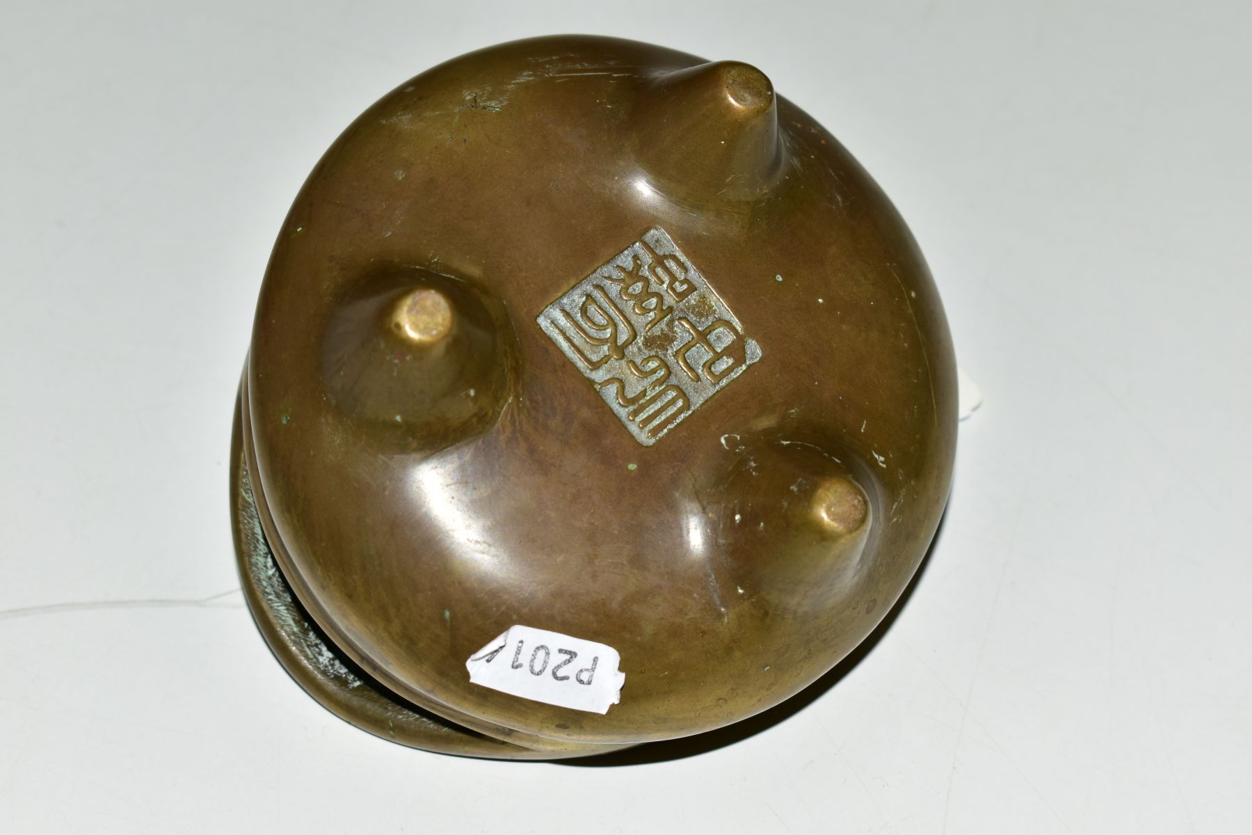 A CHINESE POLISHED BRONZE TRIPOD CENSER, 18th / 19th Century, looped handles, cast mark to - Image 5 of 7