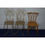 AN ERCOL BLONDE ELM CROSS SPINDLE BACK CHAIR, together with a pair of metal wire chairs (3)