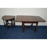 AN EARLY TO MID 20TH CENTURY OAK DRAW LEAF TABLE, on bulbous supports, united by a cross