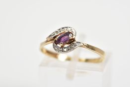 A 9CT GOLD AMETHYST AND DIAMOND DRESS RING, the central oval amethyst set on a diagonal within a