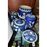 THREE PIECES OF DARK BLUE WEDGWOOD JASPERWARE AND TWO SIMILAR ADAMS PIECES, comprising a