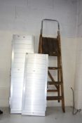 TWO ALUMINIUM FOLDING RAMPS, one 122cm long, the other 92cm long and a pair of vintage step ladders