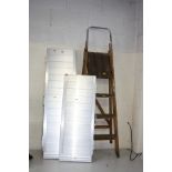 TWO ALUMINIUM FOLDING RAMPS, one 122cm long, the other 92cm long and a pair of vintage step ladders