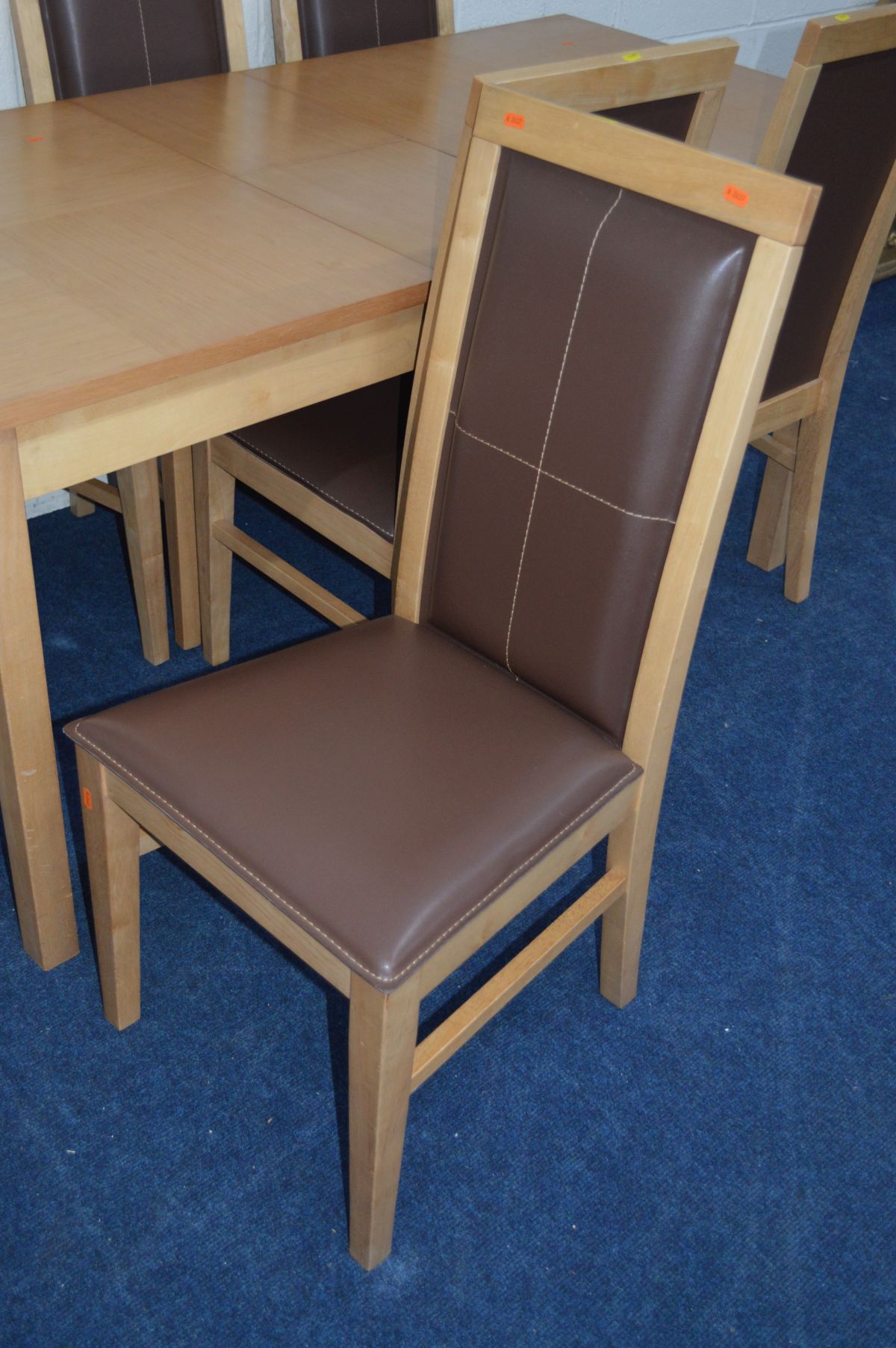 A RECTANGULAR EXTENDING BEECH DINING TABLE with six matching leatherette chairs (7) - Image 3 of 3