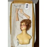 A WAX HEAD AND SHOULDERS HALF DOLL, marked 3.N.G.H to back, possibly Olga Baitz, painted features,