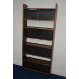 A 1940'S OAK FOUR SECTION BOOKCASE with double glazed sliding doors (missing one glass door),