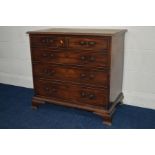 A GEORGE III MAHOGANY CHEST of two short and three long graduating drawers, swan neck handles, brass