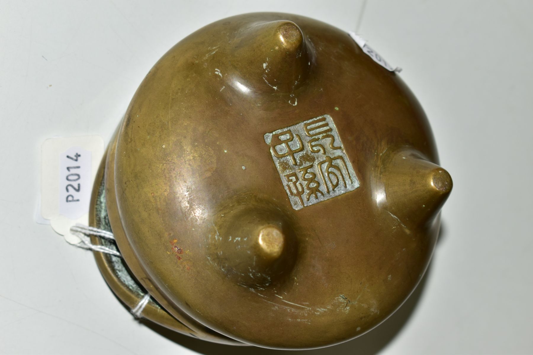 A CHINESE POLISHED BRONZE TRIPOD CENSER, 18th / 19th Century, looped handles, cast mark to - Image 6 of 7