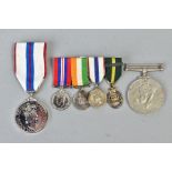 A SMALL NUMBER OF MILITARY MEDALS as follows, four miniature medals on a bar, WWII war medal,