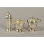 A GEORGE VI SILVER THREE PIECE CRUET SET, of conical form, comprising pepperette, open salt with