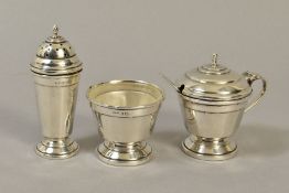 A GEORGE VI SILVER THREE PIECE CRUET SET, of conical form, comprising pepperette, open salt with