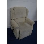 A BEIGE UPHOLSTERED ELECTRIC RISE AND RECLINE ARMCHAIR, (PAT pass and in working order)