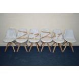 A SET OF SIX MODERN WHITE FRAMED DINING CHAIRS on a beech frame