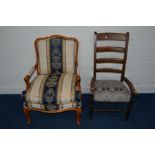 A REPRODUCTIN FRENCH STYLE ARMCHAIR, covered in striped upholstery (this chair does not comply