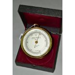 A CASED NEGRETTI & ZAMBRA OF LONDON BRASS ANEROID BAROMETER, 'Compensated for Temperature Mark I',