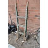 A VINTAGE WOOD AND CAST IRON SACK TRUCK, height 127cm