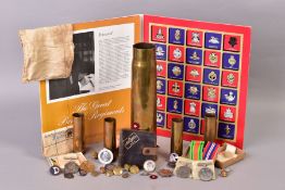 A BOX OF MILITARIA to include 'Texaco' folder of reproduction cap badges, 'The Great British