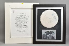 OASIS BAND AUTOGRAPHS, a framed drum skin bearing signatures by Liam and Noel Gallagher, Andy