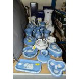 A GROUP OF WEDGWOOD JASPERWARE, including tea pot, two jugs, two trinket dishes and covers, vases,