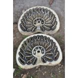 A PAIR OF VINTAGE CAST IRON TRACTOR SEATS stamped MALTA and over painted in cream and black, 46cm