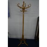 A MODERN BEECH BENTWOOD STYLE COAT STAND, height 191cm