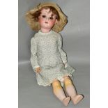 AN ARMAND MARSIELLE BISQUE HEAD DOLL, nape of neck marked 'Armand Marsielle Germany 390 A.7.M.',