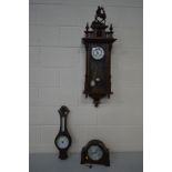 AN EARLY 20TH CENTURY WALNUT VIENNA WALL CLOCK, with a resin Stag pediment figure (winding key and