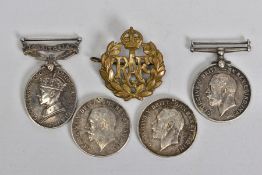 A SELECTION OF MEDALS, to include three George V 1914-1918 medals, an oval territorial medal,