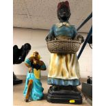 TWO NOVELTY FIGURES, a Vallauris pottery saucy figure, height approximately