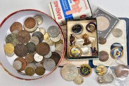 A ROUND CARDBOARD TUB OF MIXED COINAGE to include a small amount of silver coins, a (legless)