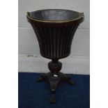 A GEORGE II MAHOGANY CYLINDRICAL WINE COOLER/JARDINIERE, brass handle, pewter liner of a spindled