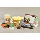 A BASKET OF MISCELLANEOUS ITEMS, to include fairings, small Black Forest bear, Carlton Ware