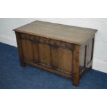 A REPRODUCTION OAK TRIPLE PANEL BLANKET CHEST, width 91cm x depth 46cm x height 53cm