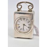 A SILVER DREW AND SONS CARRIAGE CLOCK, the white clock face with Roman numerals set within a plain