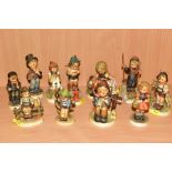 A GROUP OF ELEVEN HUMMEL FIGURES to include 'Chimney Sweep 12', 'Sensitive Hunter' 6/0, 'Goose