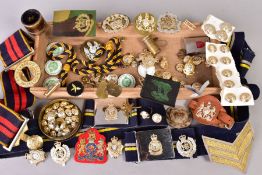 A BOX CONTAINING NUMEROUS ITEMS OF MILITARIA to include three striped canvas Regimental belts, two