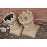 A PAIR OF CASTLEATED CHIMNEY POTS, height 56cm (one top ring cracked) (2)