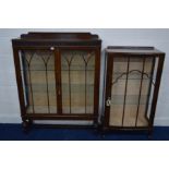 AN EARLY TO MID 20TH CENTURY OAK GLAZED TWO DOOR CHINA CABINET, on bulbous legs, width 105cm x depth