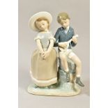 A LLADRO FIGURE GROUP ADOLESENCE BY ALFREDO RUIZ, of a boy seated playing a mandolin and a girl