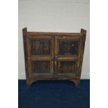 A VICTORIAN SCUMBLED PINE TWO DOOR CUPBOARD, with fixed shelves, width 101cm x depth 26cm x height