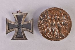 A GERMAN 3RD REICH WWII IRON CROSS 2ND CLASS, no ribbon, two piece construction, no makers mark on