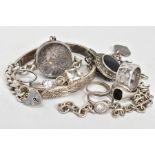 A SELECTION OF ITEMS, to include a curb link bracelet with heart locket and safety chain, a round