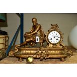 A LATE 19TH CENTURY GILT METAL MANTEL CLOCK, figural mount of Shakespeare, enamel dial, Roman