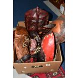 A BOX OF AFRICAN STYLE TRIBAL MASKS, comprising of wood, copper and terracotta examples (11)