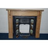 A VICTORIAN PINE FIRE SURROUND, width 137cm x depth 18cm x height 119cm, with a black painted cast