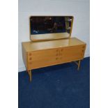 A 1960'S MEREDEW LIGHT OAK DRESSING CHEST, with a rectangular mirror with rounded corners on twin