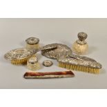 A COLLECTION OF SILVER MOUNTED DRESSING TABLE ITEMS, comprising a four piece dressing table set in