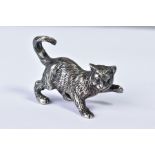 A VINTAGE SILVER PLATED MODEL OF A CAT, cast in a pouncing stance with tail curled up, height 3.5cm