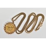 A 9CT GOLD SOVEREIGN NECKLACE, the Edward VII dated 1909, sovereign mounted within a rope twist