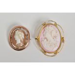 TWO CAMEO BROOCHES, the first of oval design depicting a lady in profile within a scrolling detail